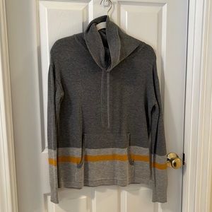 Cynthia Rowley Woman’s sweater with front pocket detail. Size  S.